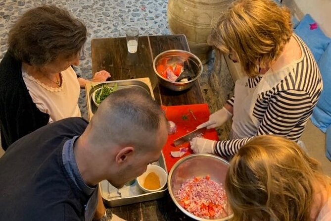 Greek Cuisine Cooking Class in Santorini with Recipes and Wine - Getting to Megalochori and settling into a small-group kitchen