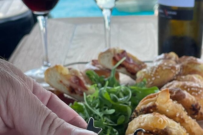 Greek Gastronomy & Wine Pairing Cruise with a Sommelier in Athens - Wine pairing expectations: included drinks, casual pairings, and what to buy