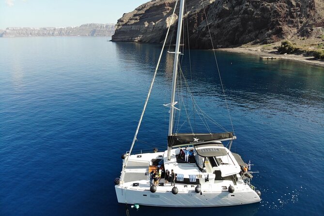 Half-Day Exclusive Catamaran Cruise in Santorini with Meal and Open Bar - Getting to Vlychada Marina Without the Taxi Stress