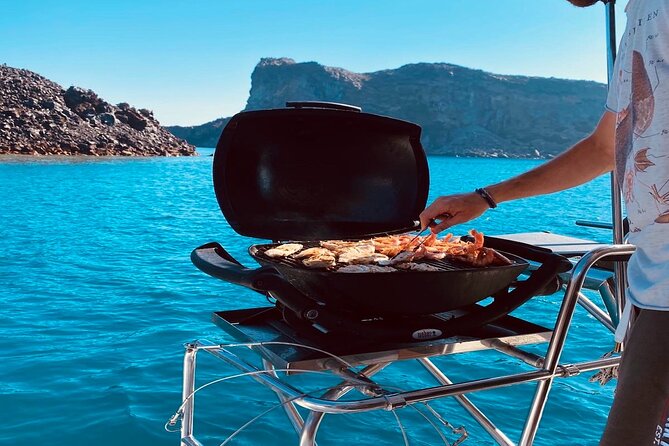 Half-Day Exclusive Catamaran Cruise in Santorini with Meal and Open Bar - Thirassia Island, Snorkelling Time, and the Onboard BBQ Lunch