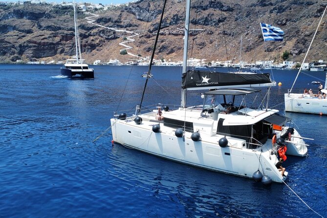 Half Day Premium Catamaran Cruise in Santorini including Oia - Premium catamaran, with a relaxed caldera rhythm