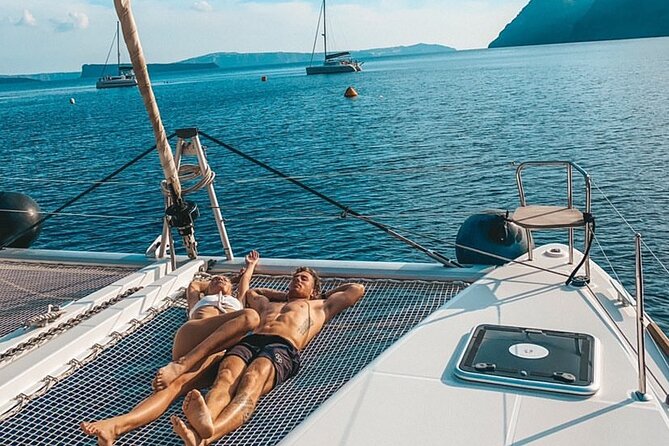 Half Day Premium Catamaran Cruise in Santorini including Oia - BBQ dinner and open bar: what you get for the price