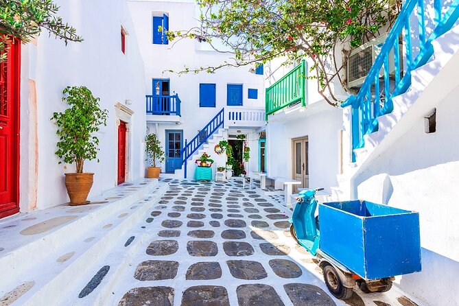 Half Day Private Tour Island with a Local in Mykonos - Psarou Beach: famous yacht views in a tight 15-minute window