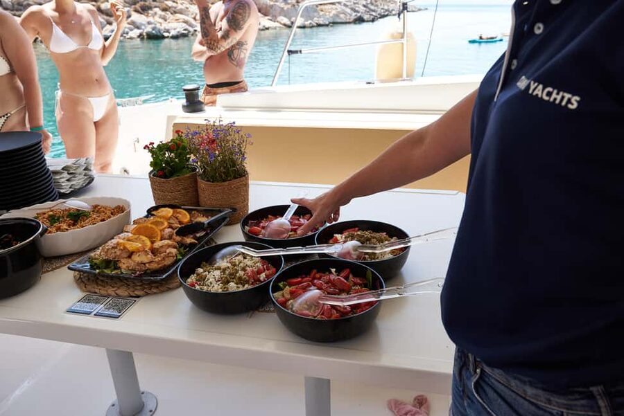 Hersonissos: Catamaran Sailing Trip to Dia Island with Lunch - Lunch on Board: Mediterranean Food That Actually Feeds People