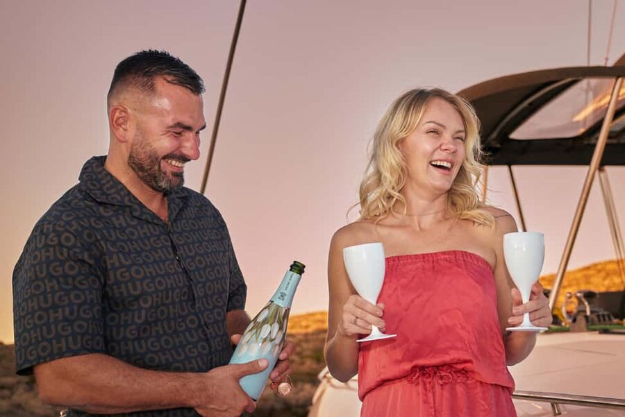 Hersonissos: Sunset Catamaran Cruise with Snacks and Drinks - Signing In at Hersonissos Port: finding DanEri Yachts fast