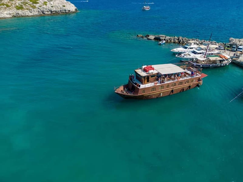 Kolympia : Transfer & Cruise to Lindos with 3 Swimming Stops - The return cruise swim stops: Navarone Bay, Stegna, Tsampika