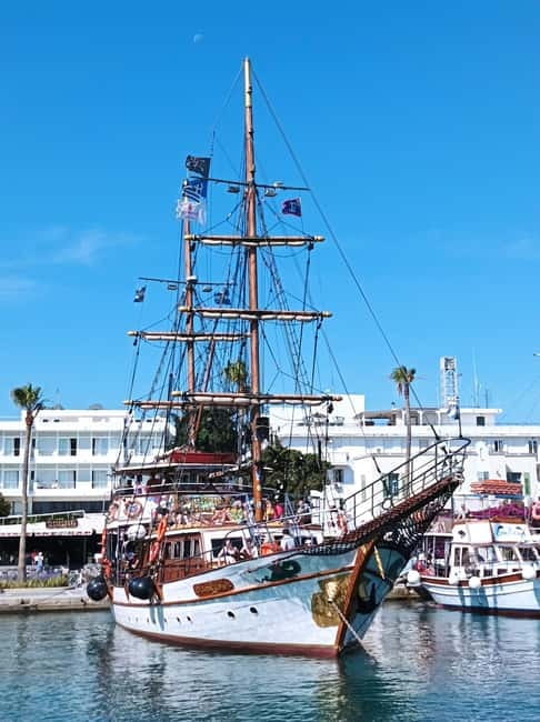 Kos: 3-Island Cruise with Lunch and Hotel Transfer - Life on board: wooden yacht, shade, and a bar that stays in reach