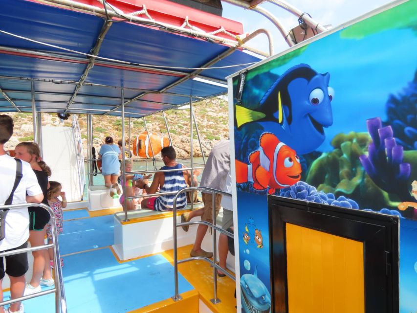 Kos Town: Glass-Bottom Boat Cruise with Swimming Stops - Kos Town Boarding: Finding Yellow Dorry and Scoring the Right Spot