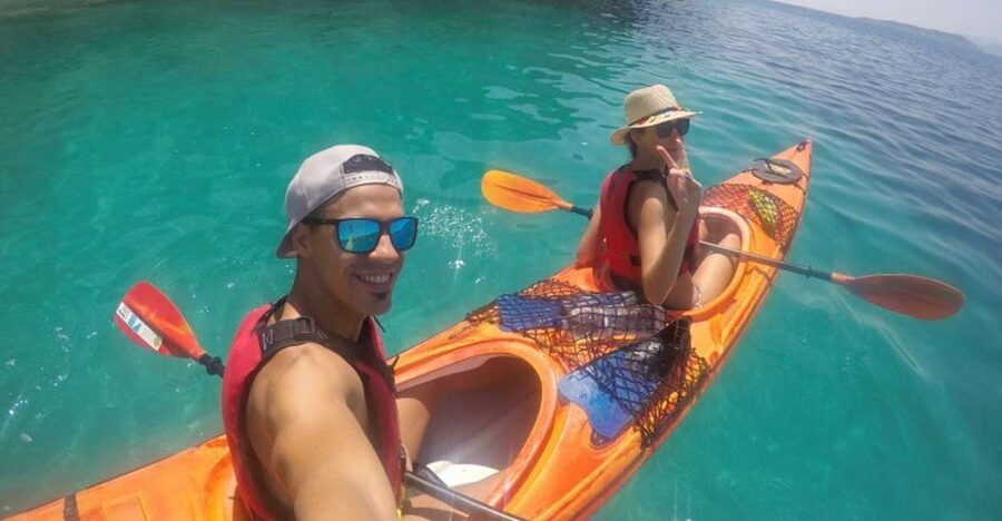 Lefkada: Hidden Blue Cave Kayak Trip with Lunch & Fruits - Paddling out of Mikros Gialos, then straight to the cave