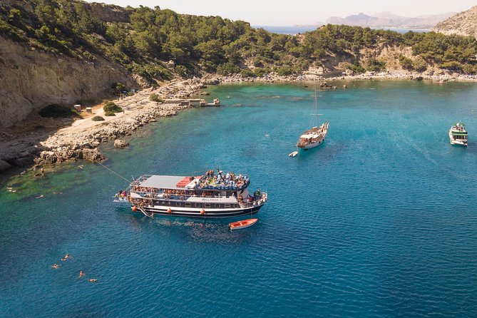 Lindos Day Cruise from Rhodes Town with Swimming stops and Hotel Transfers - Rhodes pick-up to Mandraki Port, the easy start