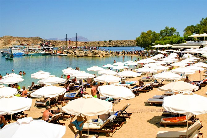 Lindos Day Cruise from Rhodes Town with Swimming stops and Hotel Transfers - Lindos village on foot: beaches, backstreets, and that acropolis climb reality