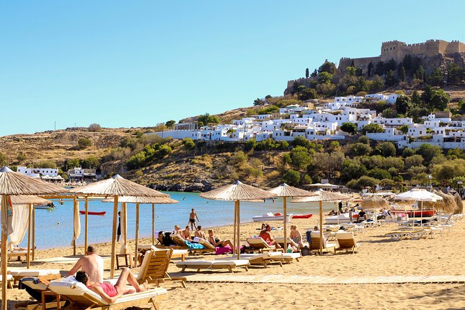 Lindos Day Cruise from Rhodes Town with Swimming stops and Hotel Transfers - Boat comfort, shade choices, and food onboard