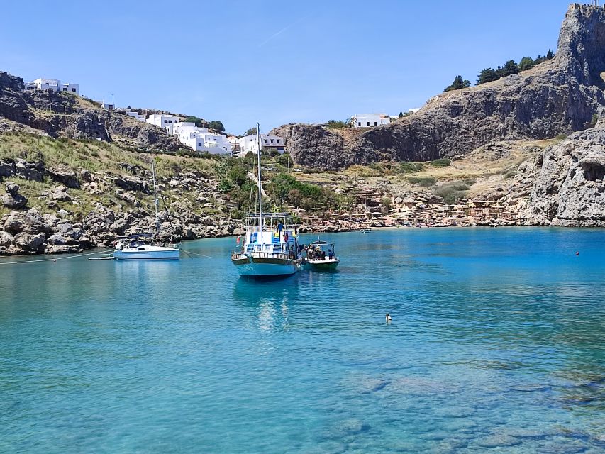 Lindos: Rhodes South-East Coast Cruise with Swim Stops - Calypso boat setup: shade, sun, and room to breathe