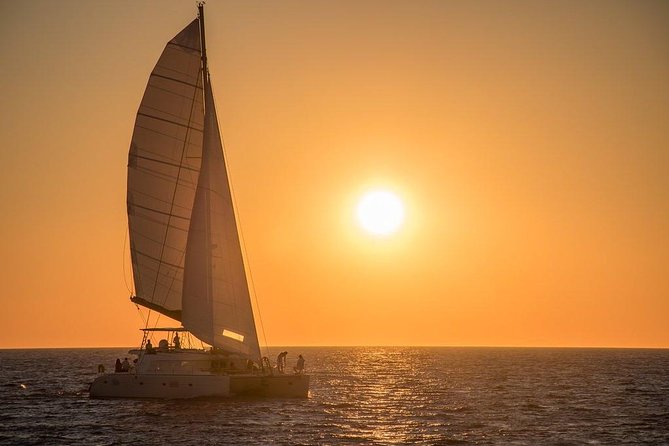 Luxury Small-Group Catamaran Cruise with BBQ, Open bar & Transfer - Palea Kameni hot springs: the classic sulfur-water stop