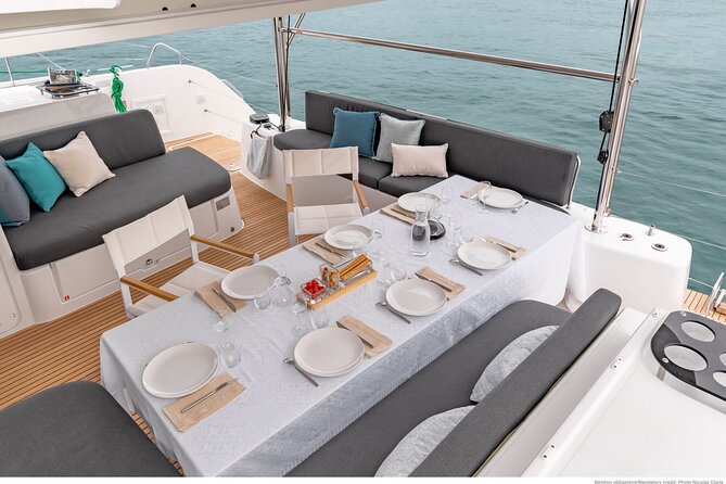 Milos & Poliegos Catamaran Cruise Homemade Full menu BBQ & Drinks - Kleftiko Beach: Pirate Caves, Big Rock Shapes, and Great Snorkeling
