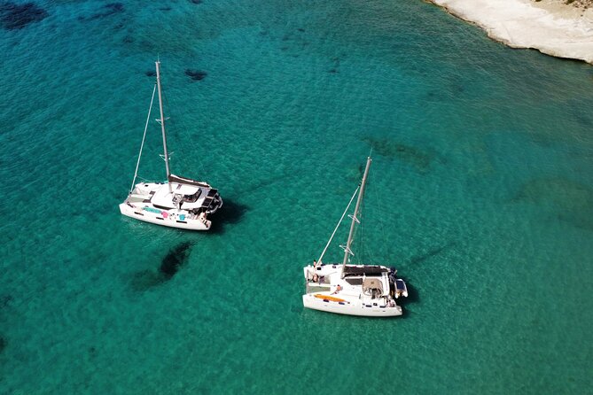 Milos & Poliegos Catamaran Cruise Homemade Full menu BBQ & Drinks - Gerakas (Παραλία Γέρακας): Sandy Beach, Hot Spring Swim, and BBQ with Drinks