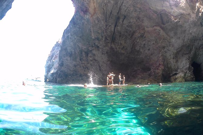 Milos Sailing Tour with snorkeling and lunch - Snorkel safari at Kleftiko, with gear and small-boat cave time