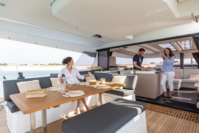 Mykonos: Brand-New Catamaran Cruise with Meal, Drinks & Transport - What you should pack for a Rhenia day