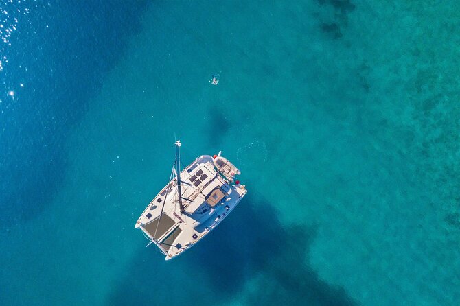 Mykonos: Private Catamaran Cruise—Hotel Pickup, BBQ & Drinks - Delos in one hour: seeing Apollo’s world without burning the whole day