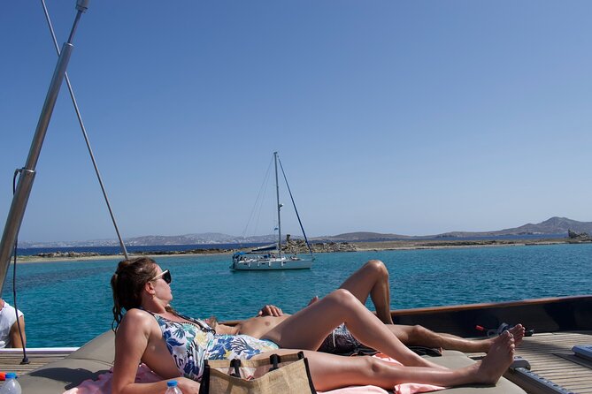 Mykonos Sail Cruise to Rhenia, Guided Tour of Delos, Lunch&Drinks - Rhenia Island Swim Stop: Golden Sand Cove, Ladder Entry, Snorkel Gear