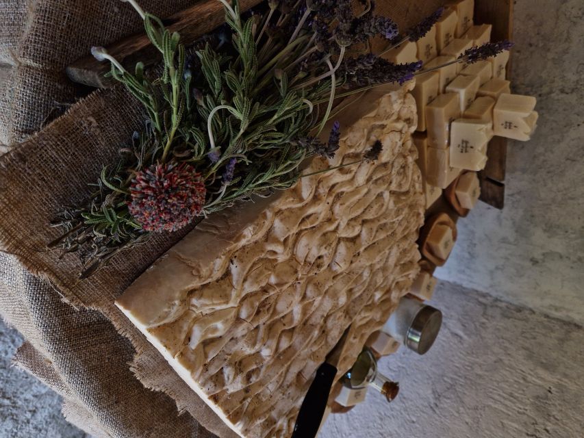 North Corfu: Olive Tour with Olive Oil Tasting and Mezze - The early 1900s olive press: where history becomes mechanics
