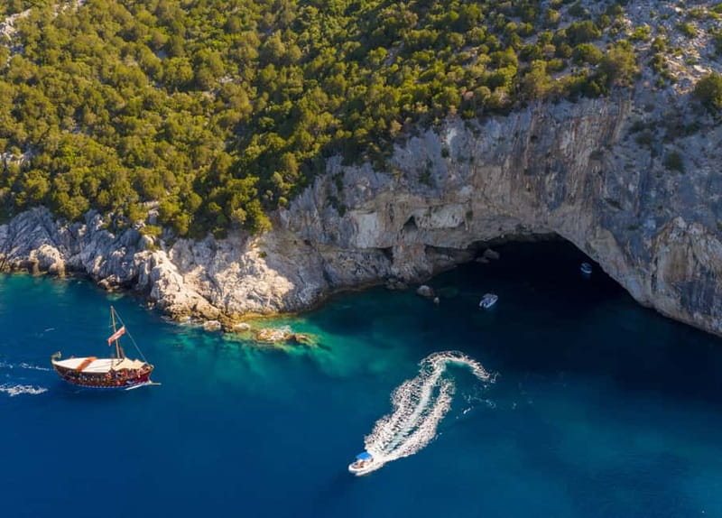 Nydri: Full-Day Wooden Boat Cruise with BBQ & Drinks - Klimaki beach time on Lefkada: parasols, snorkeling gear, and a proper BBQ