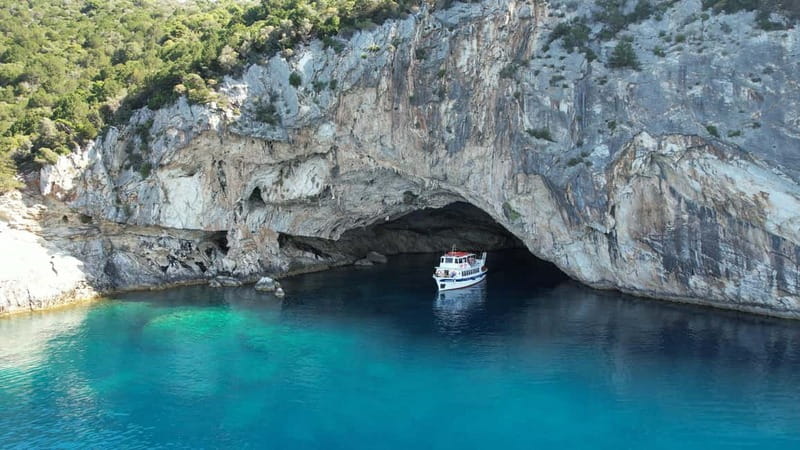 Nydri: Island Hopping Boat Cruise with Beach BBQ Lunch - Meganisi Island views: rock formations and a scenic reset