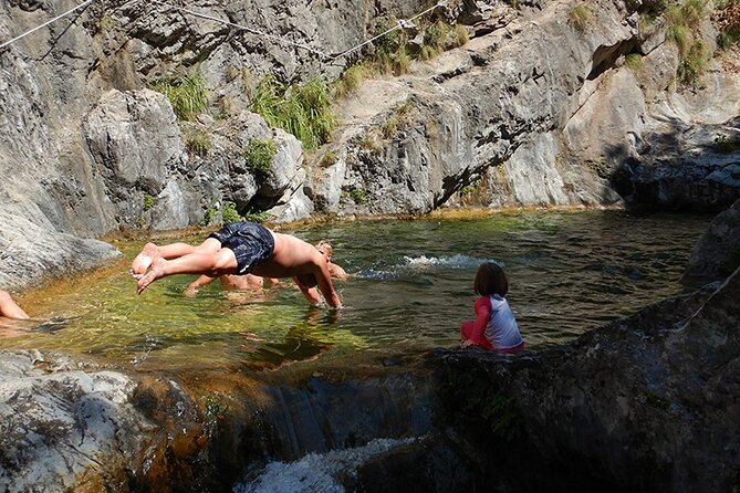 Olympus Lagoons - Enjoy nature and explore - The off-road secret lagoon: slider, big pool, then the 9m waterfall jump zone