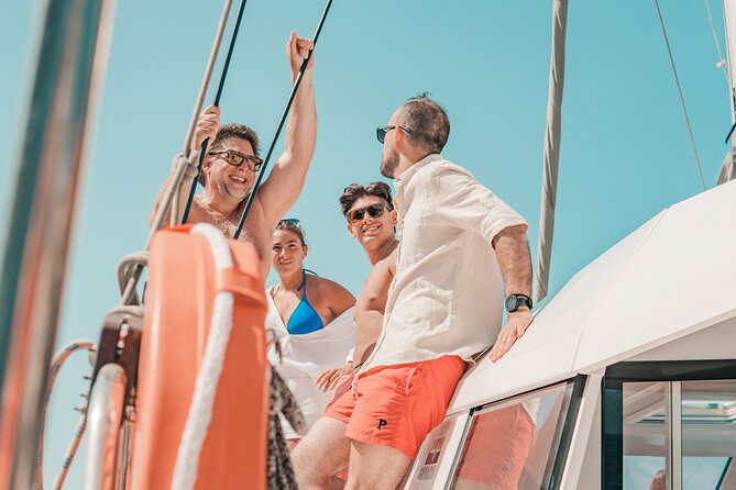 Panormo: Luxury Catamaran Cruise with Lunch & Open Bar - The water playground: SUP, snorkeling, and an inflatable flamingo