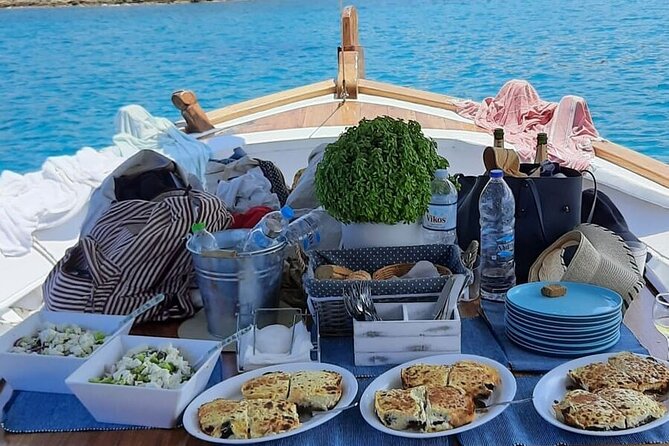 Paros Half Day Boat Tour from Naoussa port and Bay . - Stop 1: Langeri Beach and its peaceful bay water