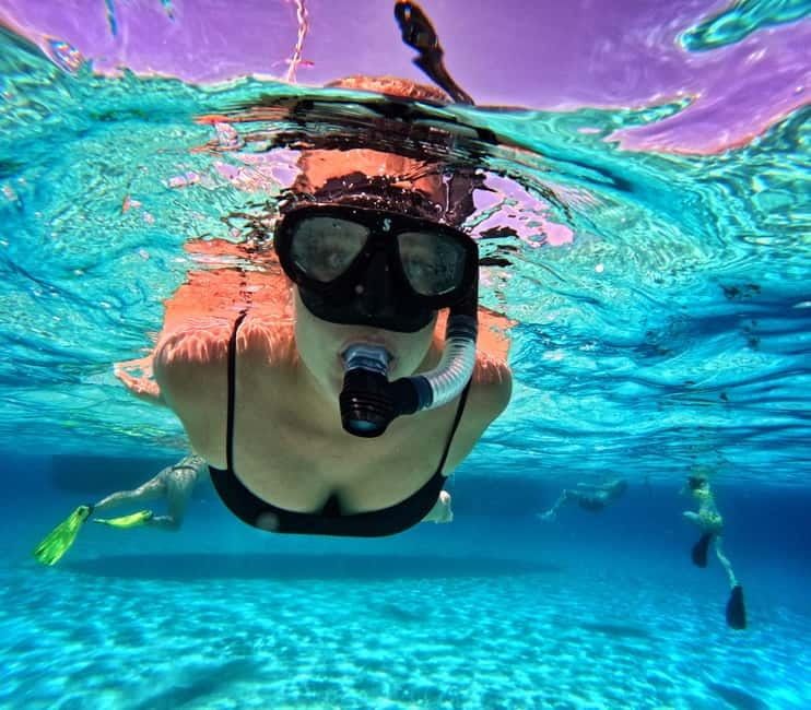 Pounta: Paros & Antiparos Cruise, Swimming & Seafood Lunch - Panagia Faneromeni Bay: reef-side swimming and calmer vibes