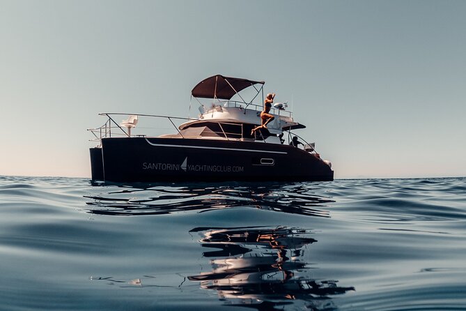 Private Caldera Cruise with Power Catamaran ENJOY incl. Meal & Drinks - Oia old fishing port views, then straight to the water