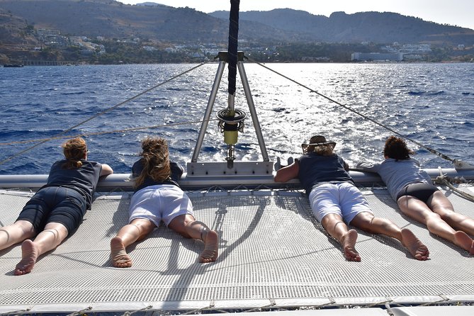 Private CATAMARAN daytrip - Lindos/ Rhodos with Lunch and drinks - Blue Lagoon anchor time: swimming and snorkeling in shallow clear water