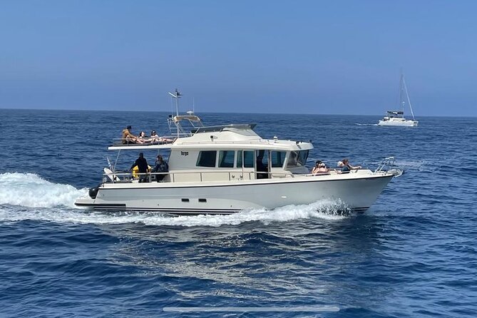 Private Full-Day Motor Yacht Cruise with Meal, Open Bar+Transfers - White Beach Swim Stop: A Small Cove With Partial Shade