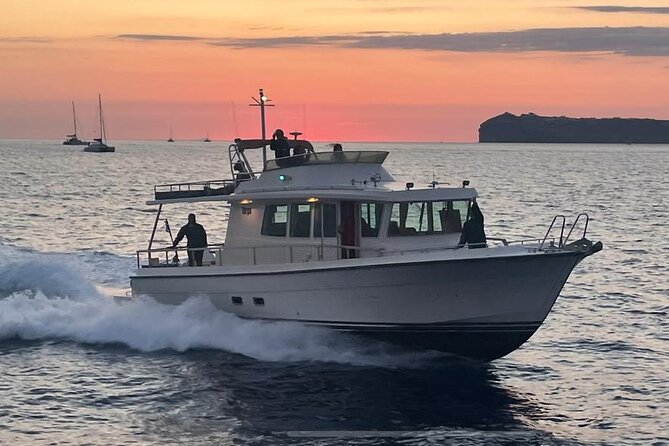 Private Full-Day Motor Yacht Cruise with Meal, Open Bar+Transfers - Red Beach Swim Stop: The Most Photogenic Plunge You Can Do Fast
