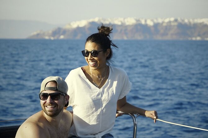 Private Luxury Santorini Catamaran Cruise with Port Pickup - Daytime vs Sunset: Choosing the Right Mood for Your Cruise
