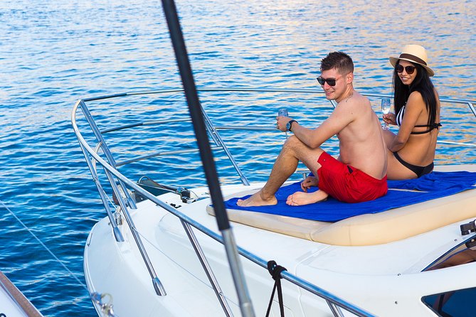 Private Motor Yacht Cruise with BBQ, Open Bar & Transfers - Palea Kameni hot springs: warm water on a volcanic schedule