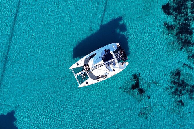 Private Mykonos Catamaran Day Cruise with Meals & Water Toys - A Mykonos catamaran day, tuned for real time on the water