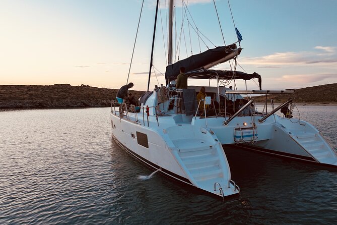 Private Mykonos Catamaran Day Cruise with Meals & Water Toys - Delos time: sightseeing optional, with ruins or more swim time
