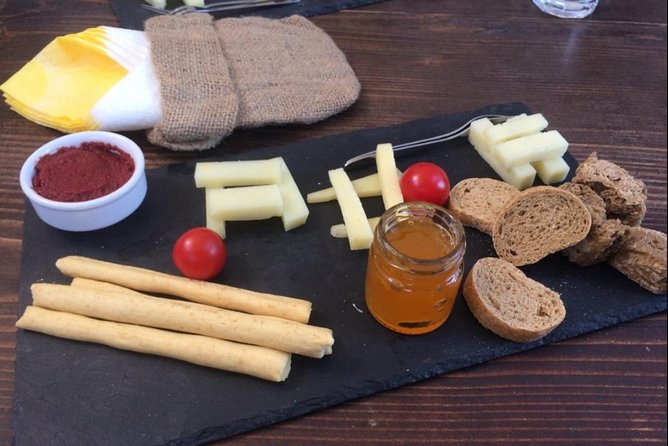 Private Santorini Cooking Class & Wine Tasting Tour - Santo Winery: Second Stop, More Varietals, and Time to Ask Questions