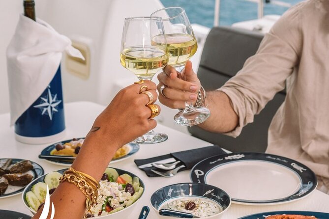 Private Sunset Cruise with Full Greek Dinner - Caldera viewpoints: Fira, Firostefani, Imerovigli, and Oia from afar