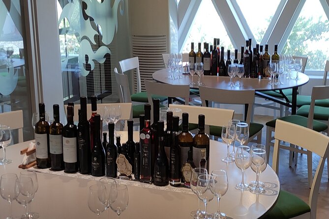 Private Wine Tour in 3 Wineries with 12 Wine Tastings and Tapas - Stop 3, Venetsanos on the Caldera Cliffs: Gravity-Fed Production and Sunset