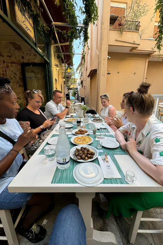 Rethymno Old Town: A Traditional Cretan Food Tour - Stop 1: A family tavern start with raki and three local dishes