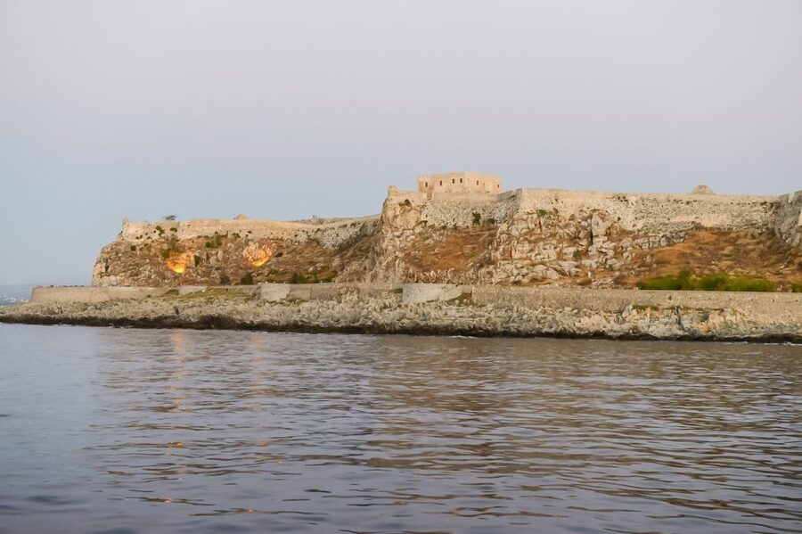 Rethymno: Sunset Cruise on a Wooden Pirate Boat - What You See: Fortezza Castle, the Venetian Port, and the Lighthouse at Dusk