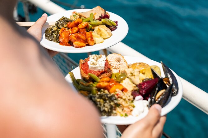 Rhodes Bay to Bay Swim Cruise-Greek Buffet w/wine included - Lunch on the boat: Greek buffet plus wine that actually helps the day