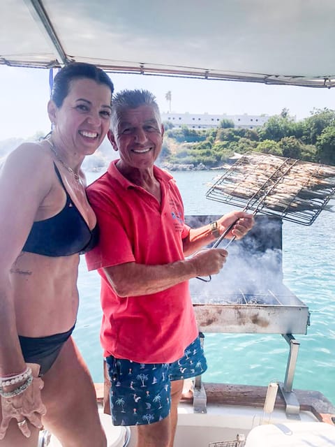 Rhodes: Captain Manolis Fishing Trip with BBQ and Swimming - Swim Near the Beach, Snorkel, and Watch the Water Close-Up