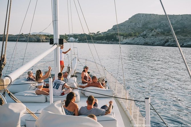 Rhodes Exclusive Sunset tour Cocktail Open bar Gourmet Live Music - Dinner On Board: Greek Buffet You Can Eat Without Stress