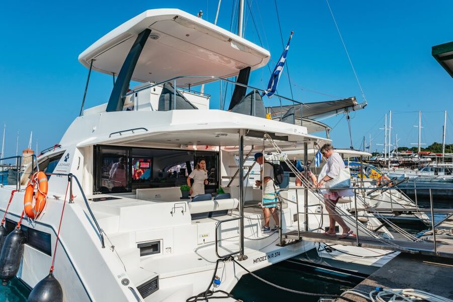 Rhodes: Sunset Catamaran Cruise with Dinner Buffet & Drinks - Mandraki Harbor start: getting onboard without stress