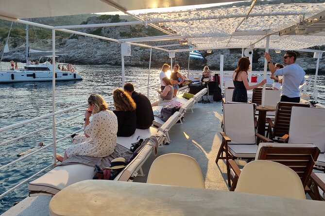Rhodes Sunset Cruise - Swim and Dine w/ Live Music & Sunset! - Live Music on the Sail Back: Guitar, Singalongs, and Good Atmosphere