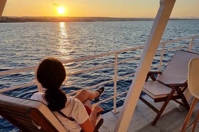 Rhodes Sunset Cruise - Swim and Dine w/ Live Music & Sunset! - Price and Value at About $58.87: What You’re Really Paying For